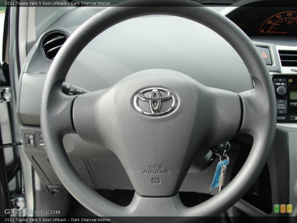 Dark Charcoal Interior Steering Wheel for the 2011 Toyota Yaris 5 Door Liftback #42978869