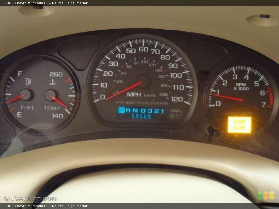 Neutral Beige Interior Gauges for the 2003 Chevrolet Impala LS #42991686