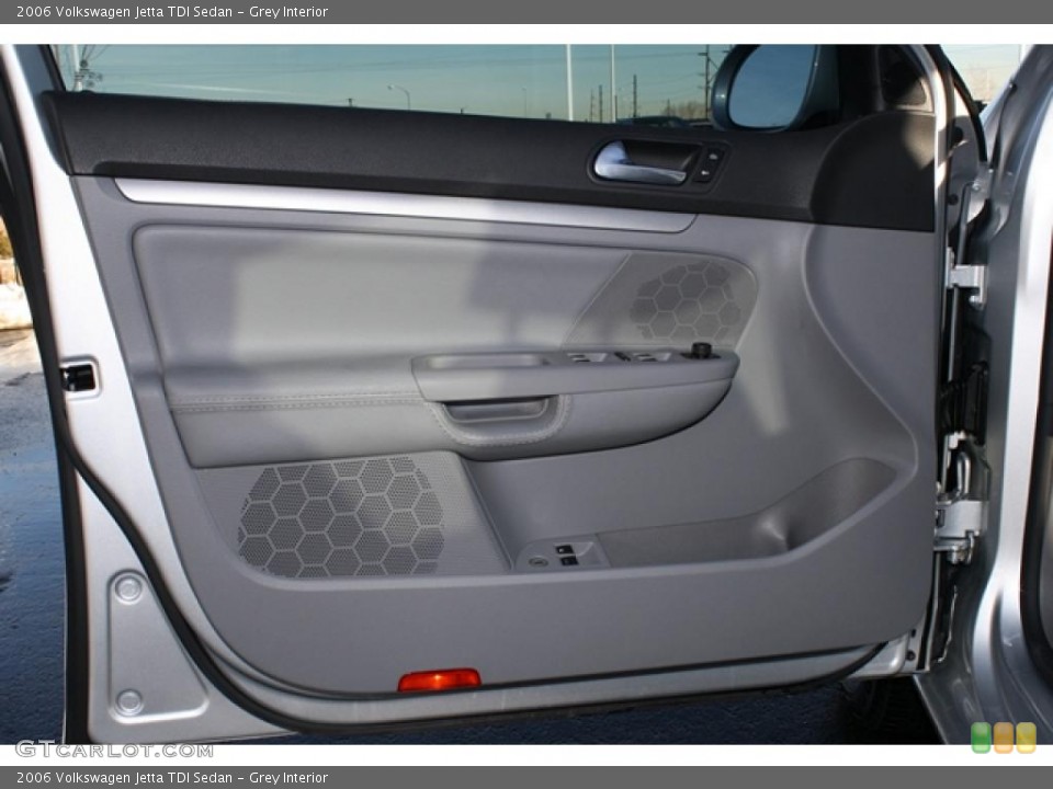 Grey Interior Door Panel for the 2006 Volkswagen Jetta TDI Sedan #43007495