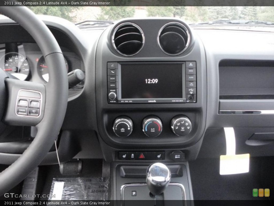 Dark Slate Gray Interior Controls for the 2011 Jeep Compass 2.4 Latitude 4x4 #43035523