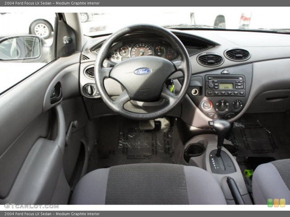 Medium Graphite Interior Dashboard for the 2004 Ford Focus LX Sedan #43057176