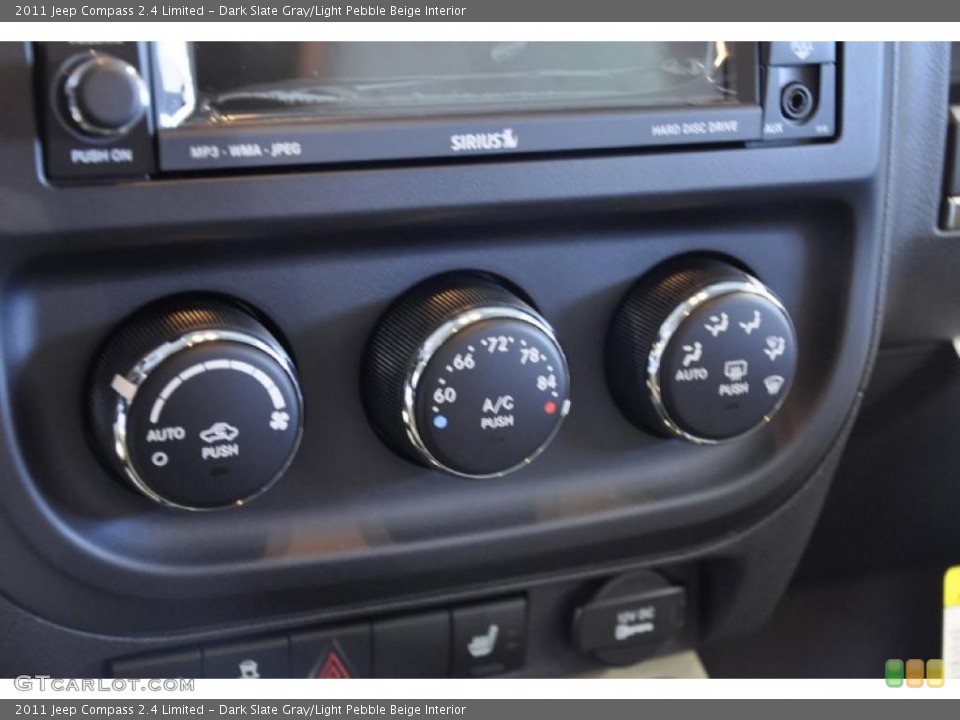 Dark Slate Gray/Light Pebble Beige Interior Controls for the 2011 Jeep Compass 2.4 Limited #43092832