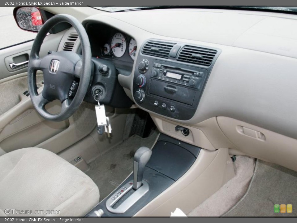 Beige Interior Dashboard for the 2002 Honda Civic EX Sedan #43101349