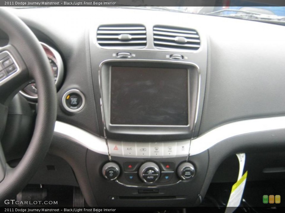 Black/Light Frost Beige Interior Controls for the 2011 Dodge Journey Mainstreet #43113441