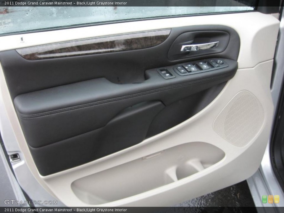 Black/Light Graystone Interior Door Panel for the 2011 Dodge Grand Caravan Mainstreet #43210278