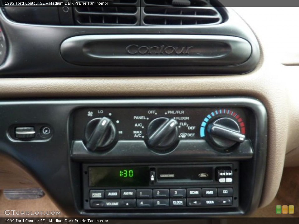 Medium Dark Prairie Tan Interior Controls for the 1999 Ford Contour SE #43214766
