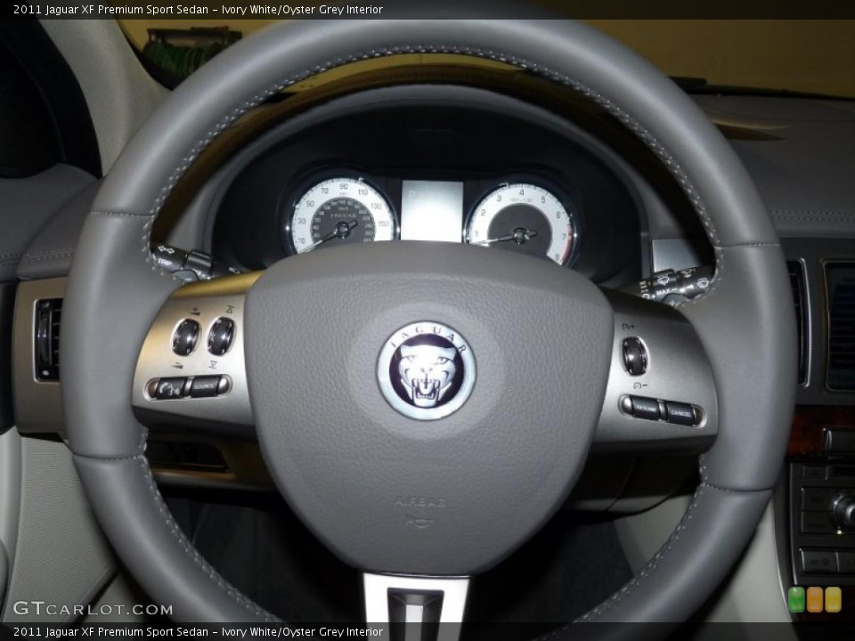 Ivory White/Oyster Grey Interior Steering Wheel for the 2011 Jaguar XF Premium Sport Sedan #43239953