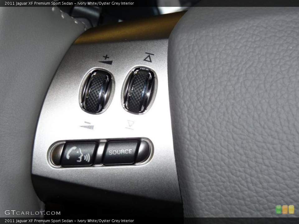 Ivory White/Oyster Grey Interior Controls for the 2011 Jaguar XF Premium Sport Sedan #43239973