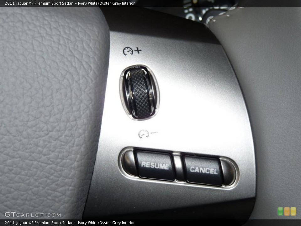 Ivory White/Oyster Grey Interior Controls for the 2011 Jaguar XF Premium Sport Sedan #43239989