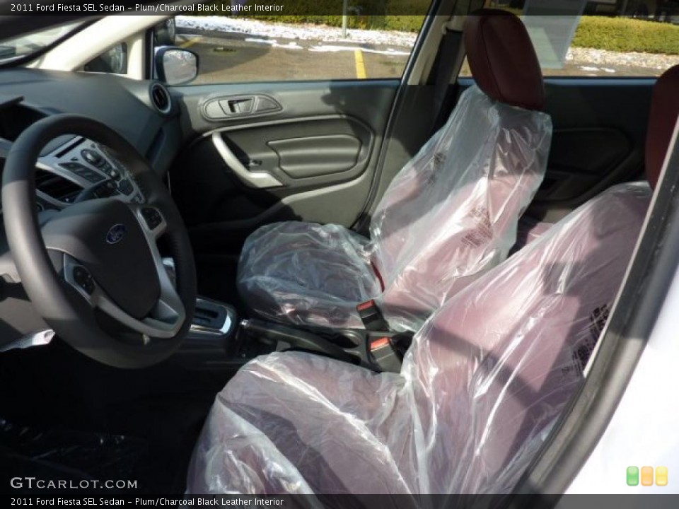 Plum/Charcoal Black Leather Interior Photo for the 2011 Ford Fiesta SEL Sedan #43261126