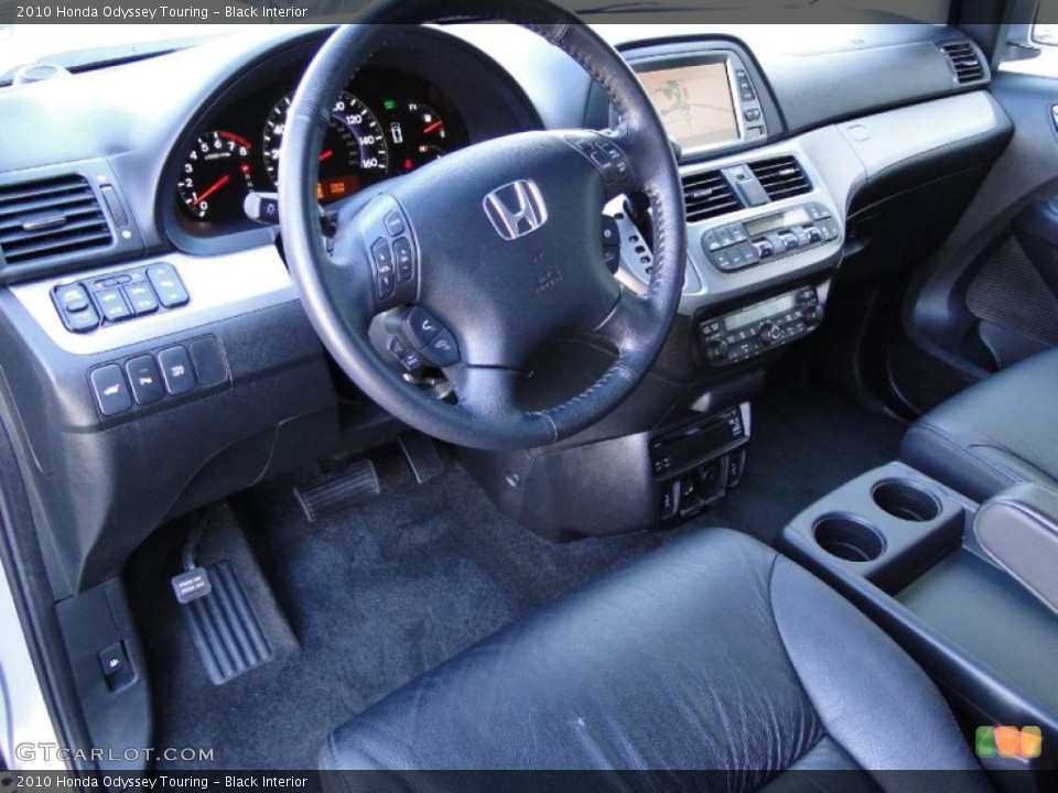 Black Interior Prime Interior for the 2010 Honda Odyssey Touring #43298884