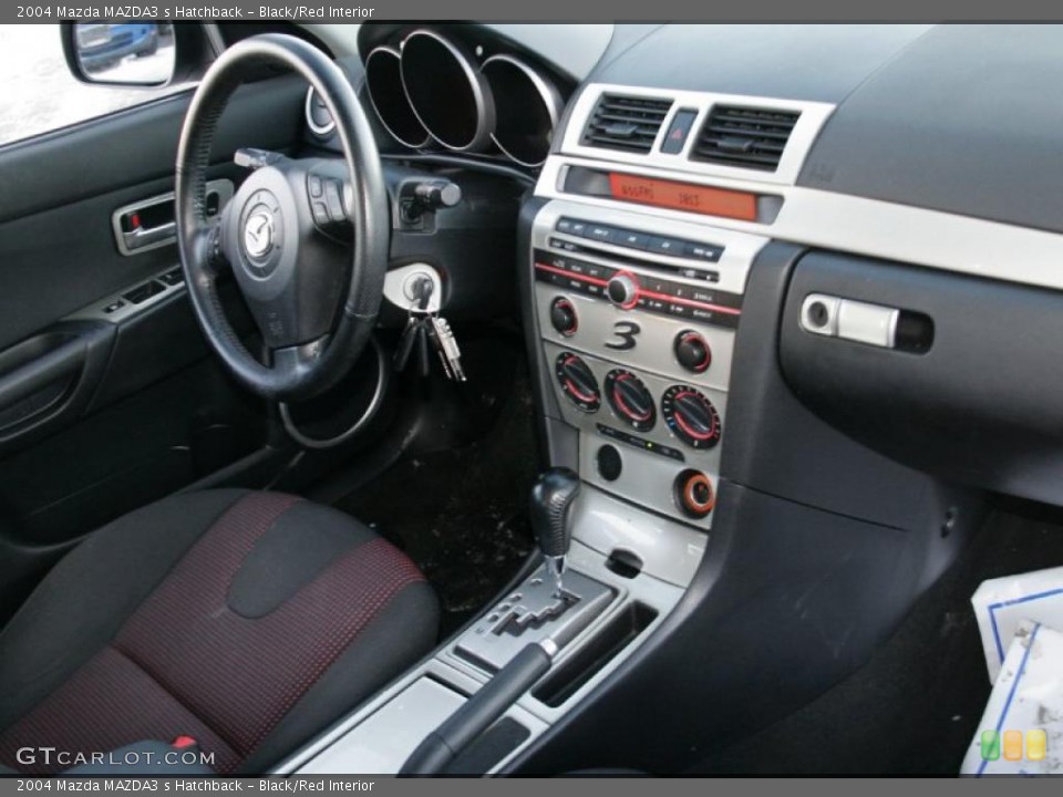 Black/Red Interior Photo for the 2004 Mazda MAZDA3 s Hatchback #43336912