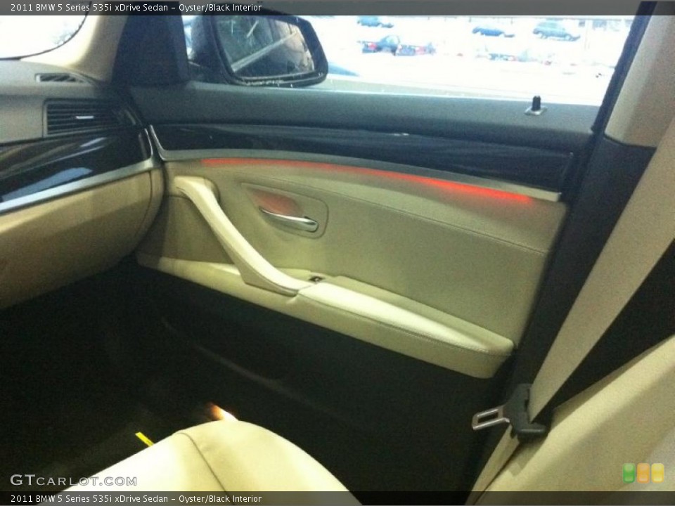 Oyster/Black Interior Door Panel for the 2011 BMW 5 Series 535i xDrive Sedan #43341803