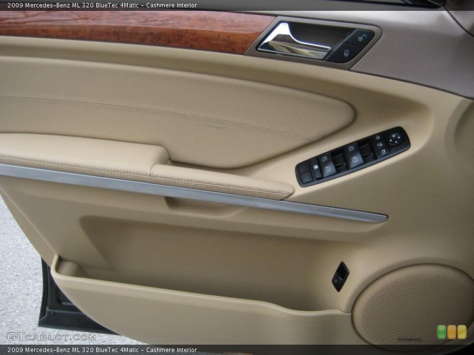 Cashmere Interior Door Panel for the 2009 Mercedes-Benz ML 320 BlueTec 4Matic #43344511