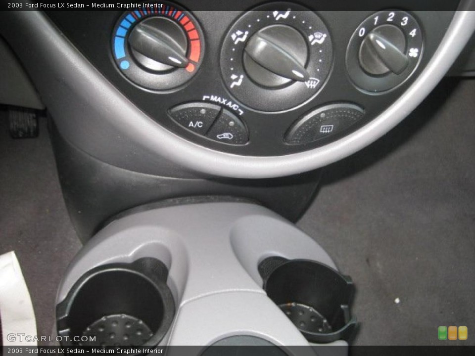 Medium Graphite Interior Controls for the 2003 Ford Focus LX Sedan #43355855