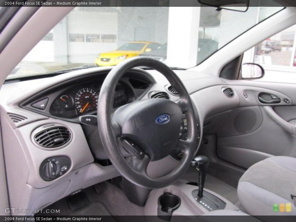 Medium Graphite Interior Dashboard for the 2004 Ford Focus SE Sedan #43360875