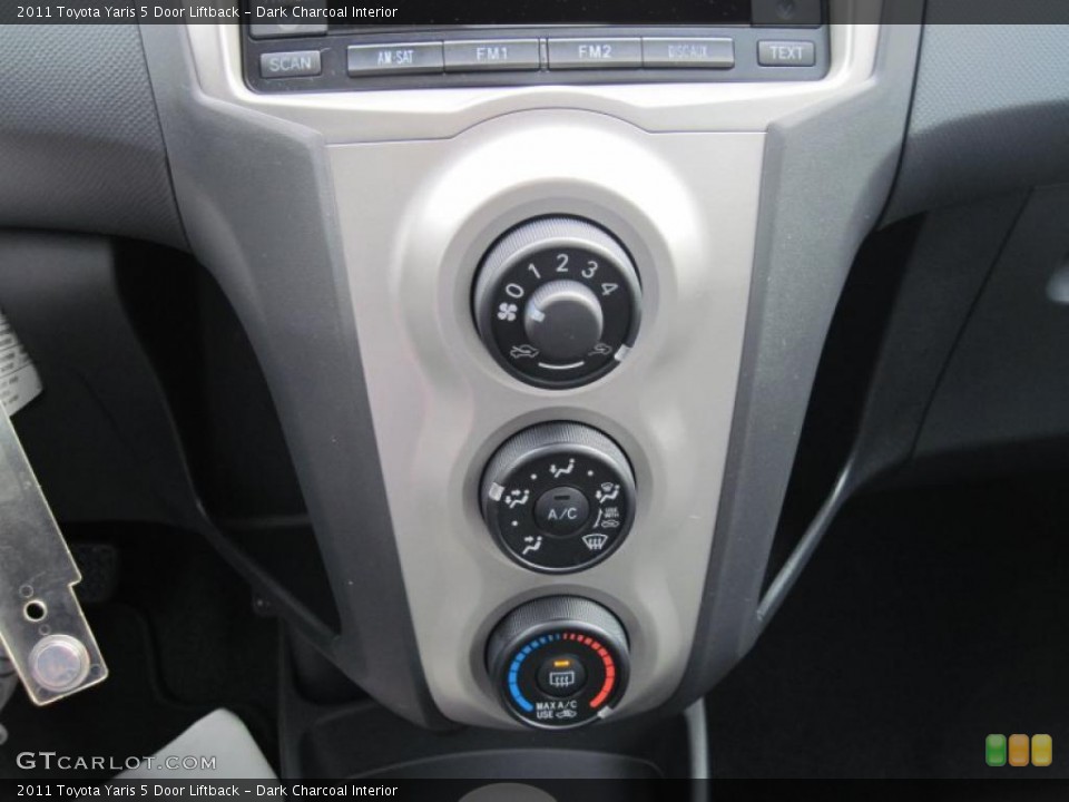 Dark Charcoal Interior Controls for the 2011 Toyota Yaris 5 Door Liftback #43362455