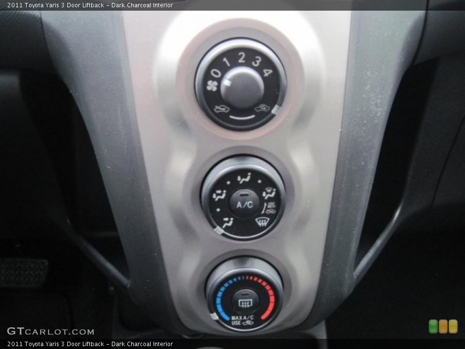 Dark Charcoal Interior Controls for the 2011 Toyota Yaris 3 Door Liftback #43364596