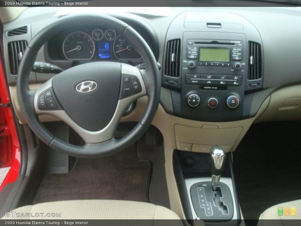 Beige Interior Dashboard for the 2009 Hyundai Elantra Touring #43371136