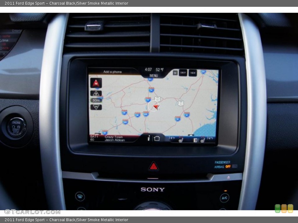Charcoal Black/Silver Smoke Metallic Interior Navigation for the 2011 Ford Edge Sport #43380122