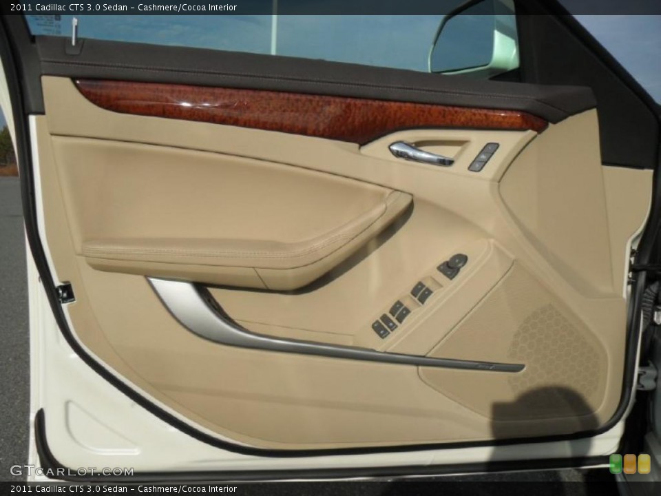 Cashmere/Cocoa Interior Door Panel for the 2011 Cadillac CTS 3.0 Sedan #43457216