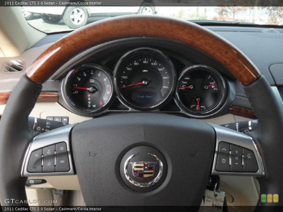 Cashmere/Cocoa Interior Controls for the 2011 Cadillac CTS 3.0 Sedan #43457296