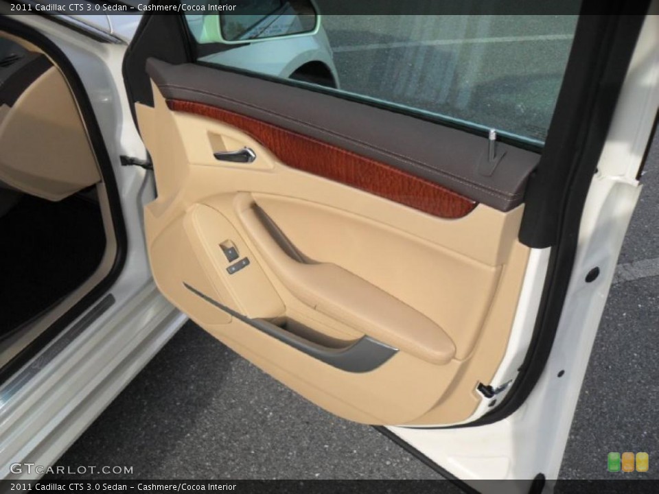 Cashmere/Cocoa Interior Door Panel for the 2011 Cadillac CTS 3.0 Sedan #43457452