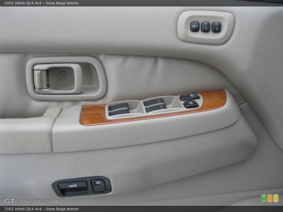 Stone Beige Interior Controls for the 2002 Infiniti QX4 4x4 #43497413