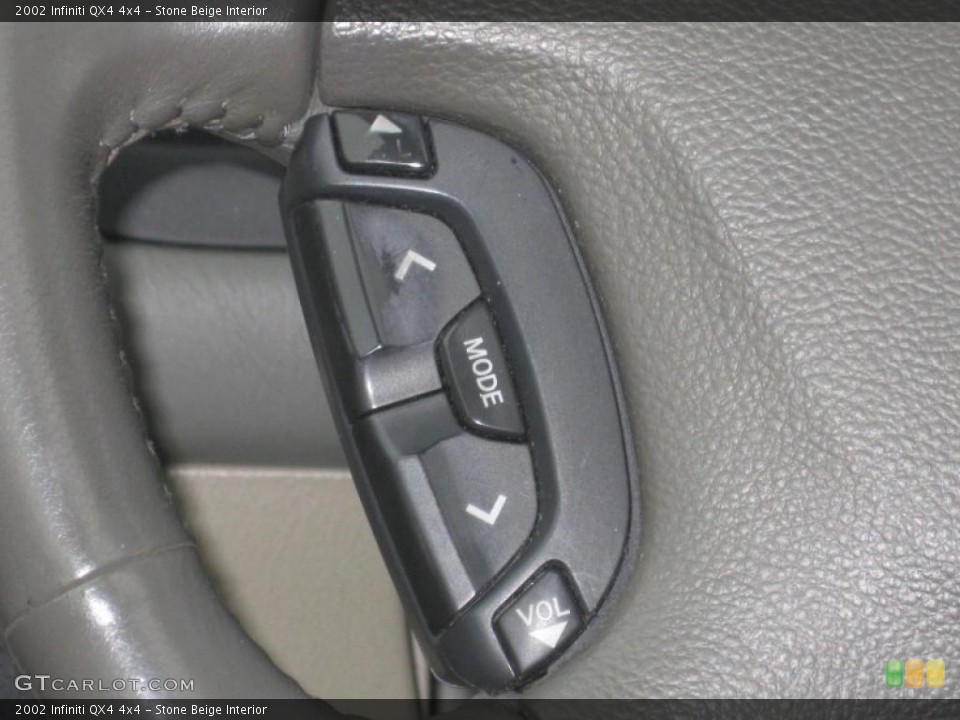 Stone Beige Interior Controls for the 2002 Infiniti QX4 4x4 #43497636