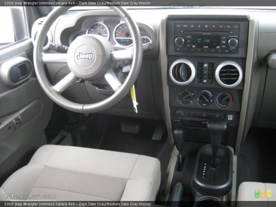 Dark Slate Gray/Medium Slate Gray Interior Dashboard for the 2009 Jeep Wrangler Unlimited Sahara 4x4 #43544368
