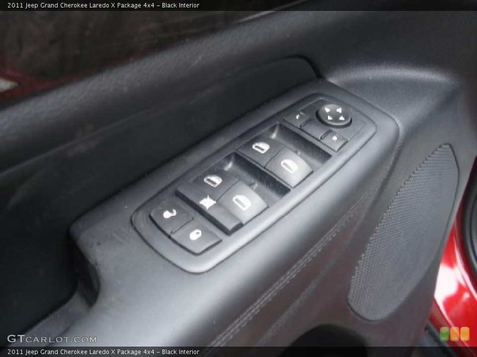 Black Interior Controls for the 2011 Jeep Grand Cherokee Laredo X Package 4x4 #43545608