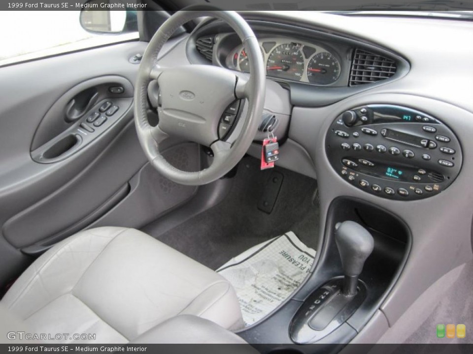Medium Graphite Interior Dashboard for the 1999 Ford Taurus SE #43549245