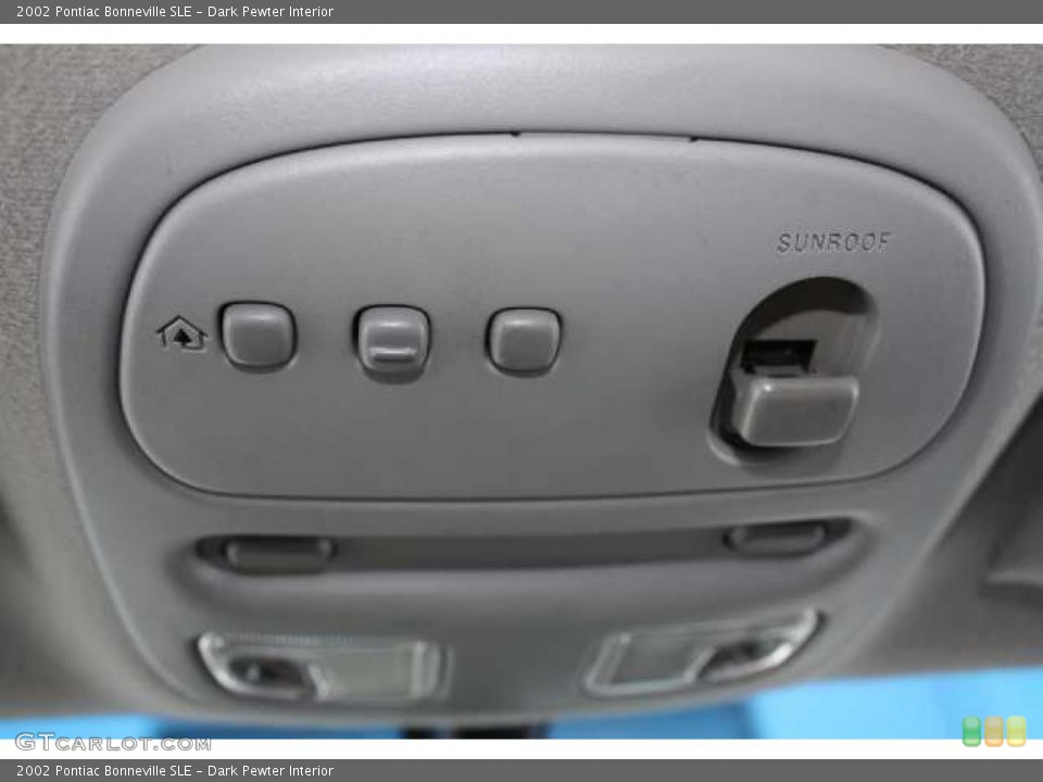 Dark Pewter Interior Controls for the 2002 Pontiac Bonneville SLE #43560542