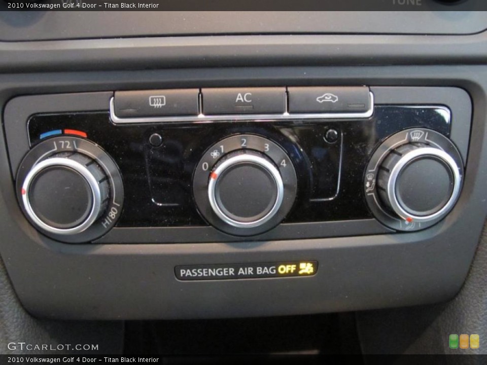 Titan Black Interior Controls for the 2010 Volkswagen Golf 4 Door #43570858