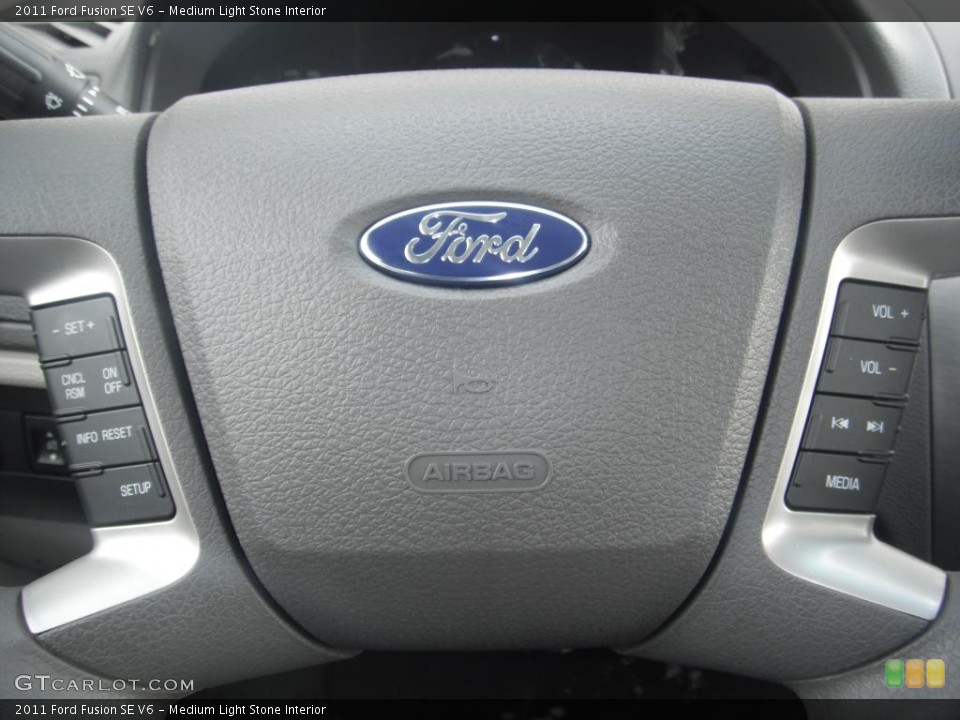 Medium Light Stone Interior Controls for the 2011 Ford Fusion SE V6 #43926798