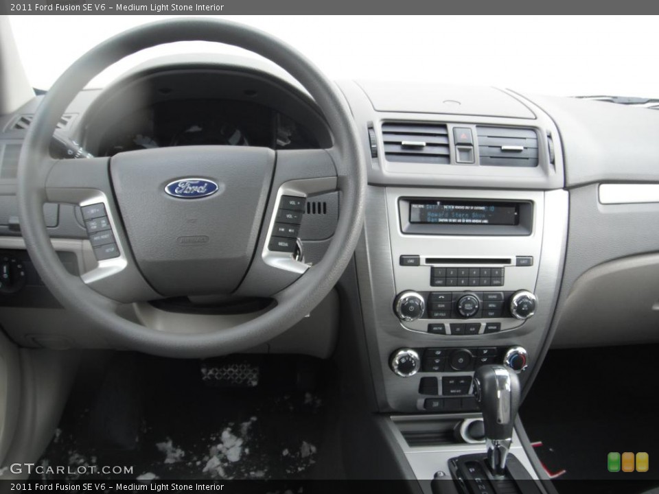 Medium Light Stone Interior Dashboard for the 2011 Ford Fusion SE V6 #43926986