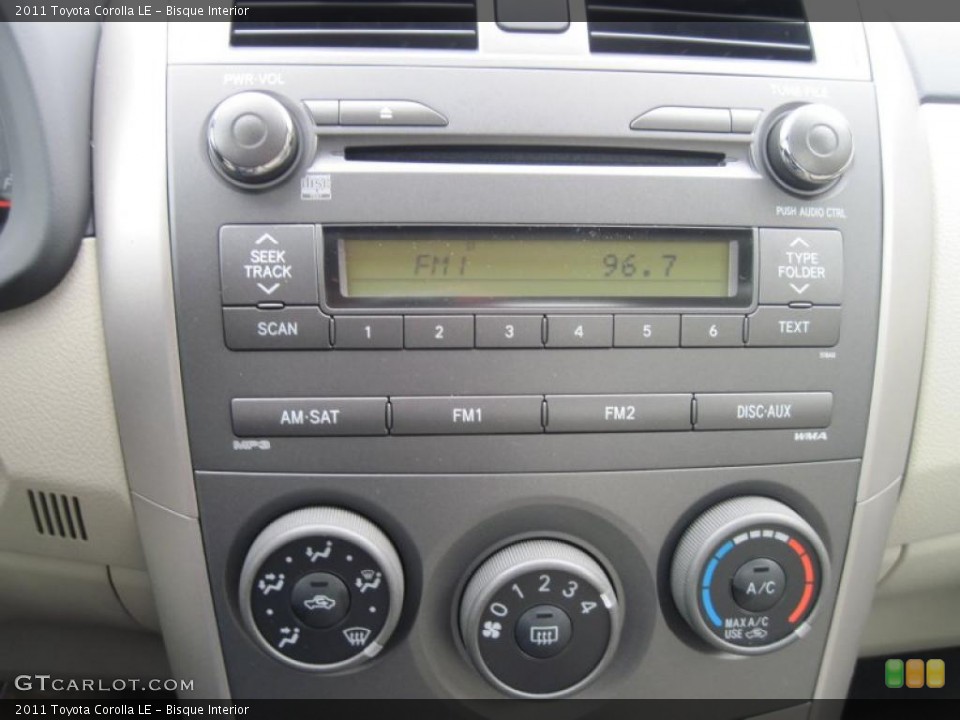 Bisque Interior Controls for the 2011 Toyota Corolla LE #43929466