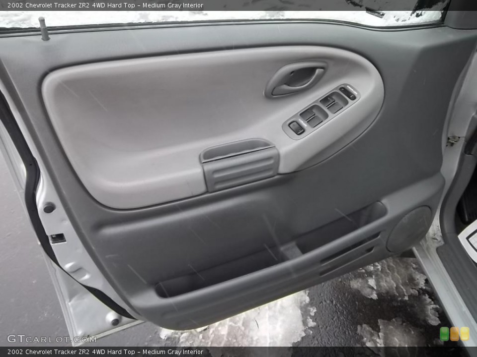 Medium Gray Interior Door Panel for the 2002 Chevrolet Tracker ZR2 4WD Hard Top #43987220