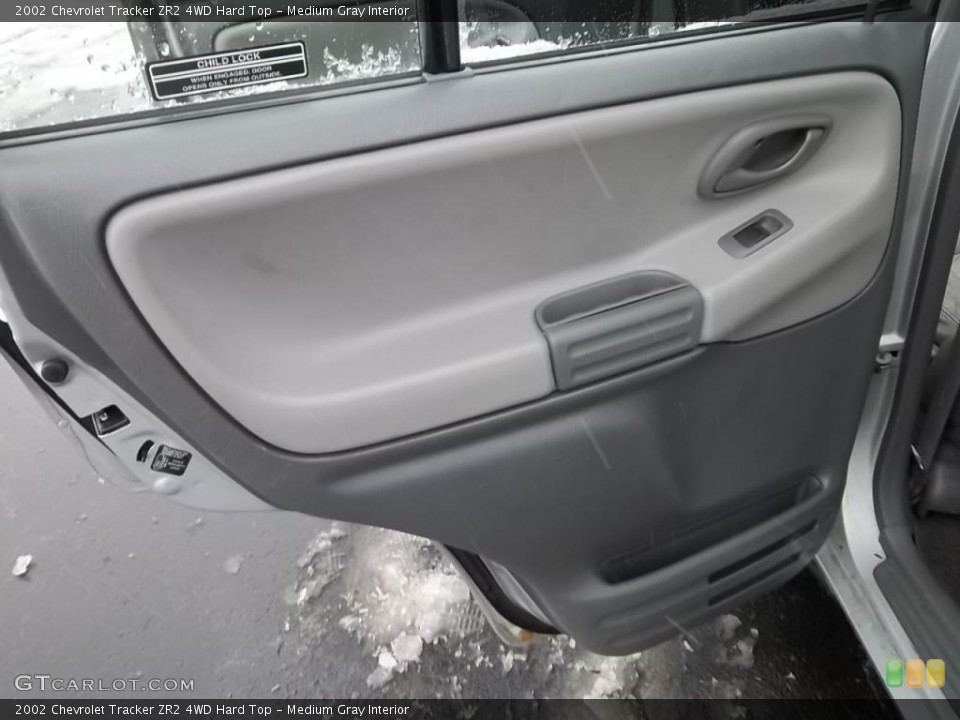 Medium Gray Interior Door Panel for the 2002 Chevrolet Tracker ZR2 4WD Hard Top #43987232