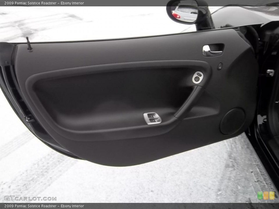 Ebony Interior Door Panel for the 2009 Pontiac Solstice Roadster #43989092