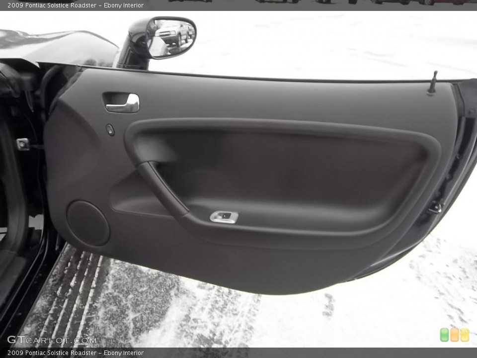 Ebony Interior Door Panel for the 2009 Pontiac Solstice Roadster #43989104