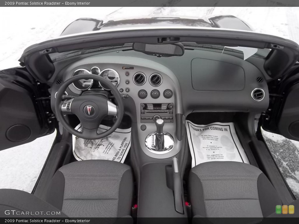 Ebony Interior Dashboard for the 2009 Pontiac Solstice Roadster #43989116