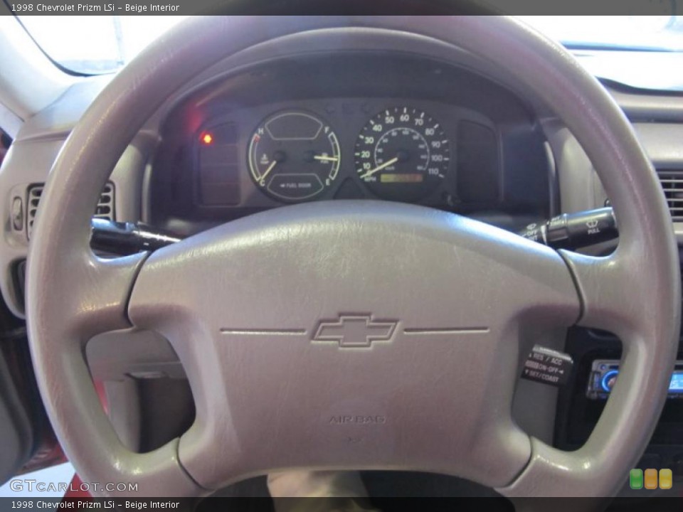 Beige Interior Steering Wheel for the 1998 Chevrolet Prizm LSi #44005251
