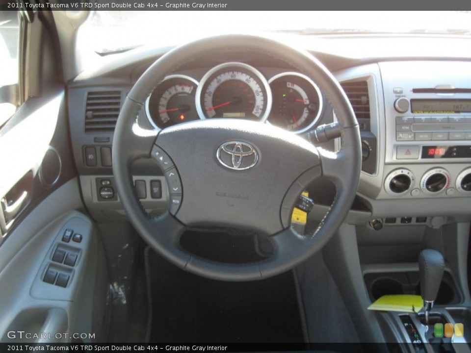 Graphite Gray Interior Dashboard for the 2011 Toyota Tacoma V6 TRD Sport Double Cab 4x4 #44014368