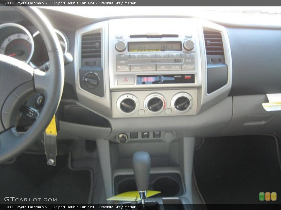 Graphite Gray Interior Dashboard for the 2011 Toyota Tacoma V6 TRD Sport Double Cab 4x4 #44014384