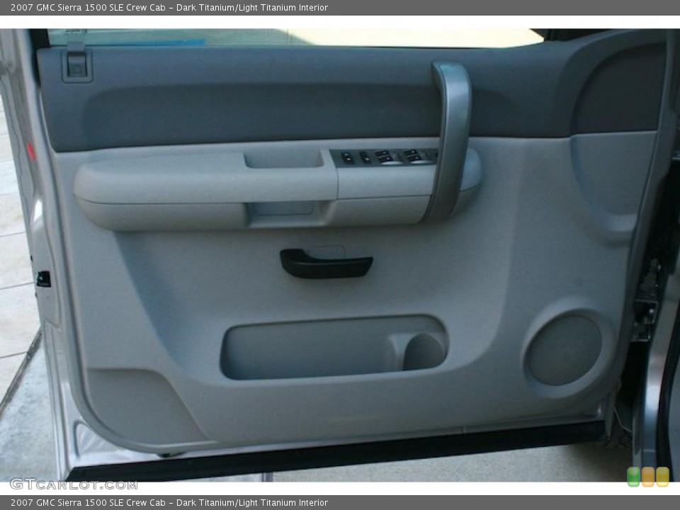 Dark Titanium/Light Titanium Interior Door Panel for the 2007 GMC Sierra 1500 SLE Crew Cab #44022459