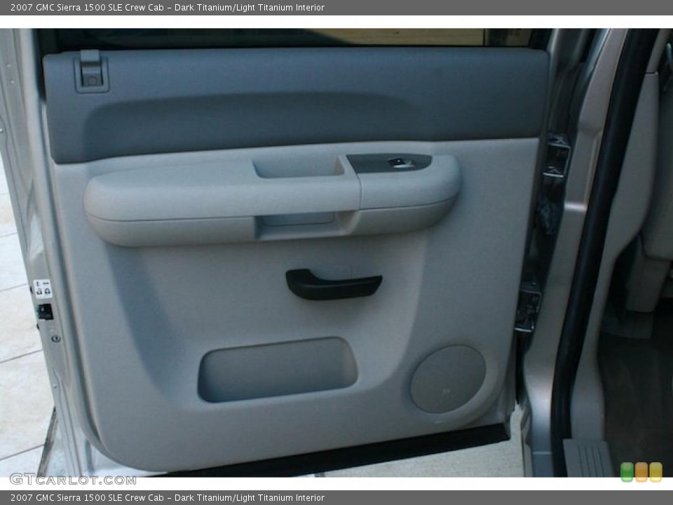 Dark Titanium/Light Titanium Interior Door Panel for the 2007 GMC Sierra 1500 SLE Crew Cab #44022472