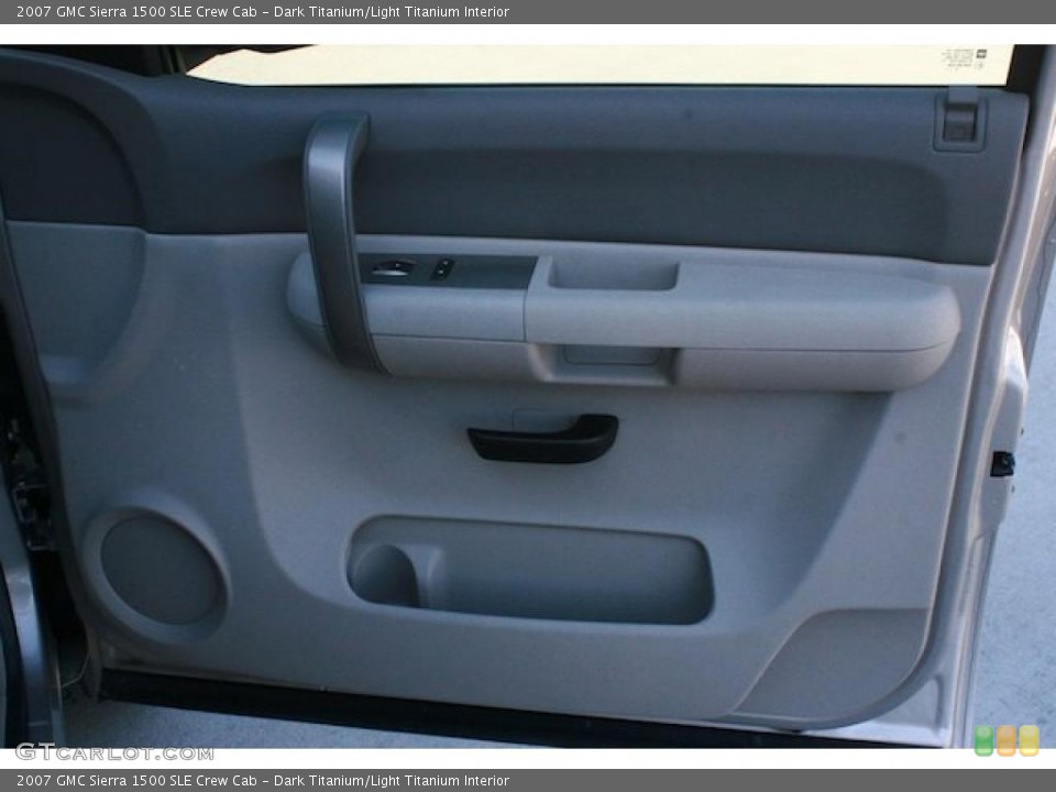 Dark Titanium/Light Titanium Interior Door Panel for the 2007 GMC Sierra 1500 SLE Crew Cab #44022500