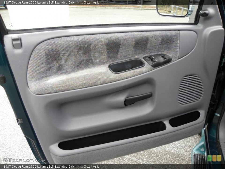 Mist Gray Interior Door Panel for the 1997 Dodge Ram 1500 Laramie SLT Extended Cab #44085857
