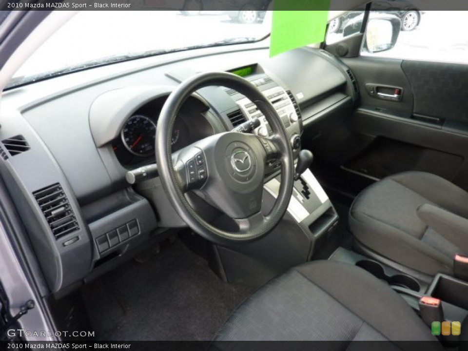 Black Interior Prime Interior for the 2010 Mazda MAZDA5 Sport #44098368